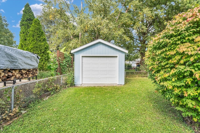 garage with a yard