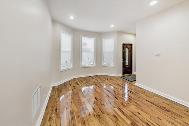 8251 S E End Ave, Chicago, IL 60617 - foyer entrance featuring light wood-style floors and recessed lighting