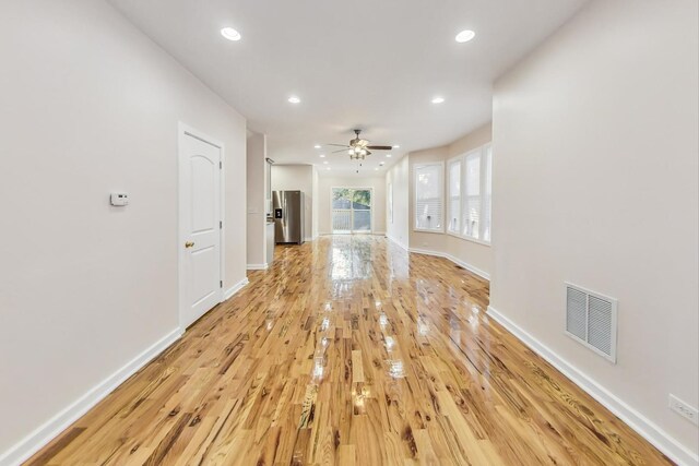 8251 S E End Ave, Chicago, IL 60617 - unfurnished living room featuring light wood-type flooring, recessed lighting, and ceiling fan