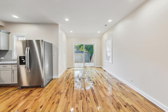 8251 S E End Ave, Chicago, IL 60617 - kitchen with stainless steel fridge with ice dispenser, light wood-type flooring, backsplash, recessed lighting, and gray cabinetry