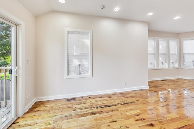 8251 S E End Ave, Chicago, IL 60617 - unfurnished room featuring wood finished floors, recessed lighting, and vaulted ceiling