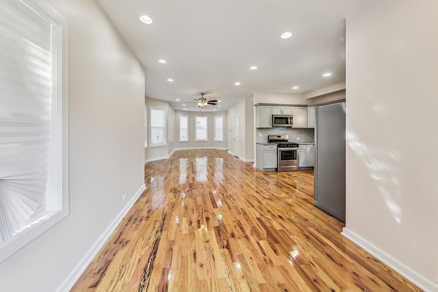 8251 S E End Ave, Chicago, IL 60617 - unfurnished living room featuring light wood-style flooring, recessed lighting, and ceiling fan