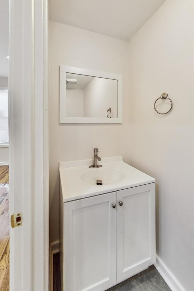 8251 S E End Ave, Chicago, IL 60617 - bathroom with vanity and baseboards