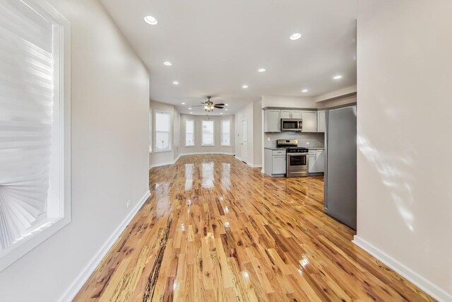 8251 S E End Ave, Chicago, IL 60617 - empty room featuring light wood finished floors and recessed lighting