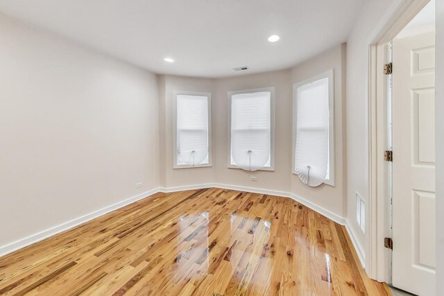 8251 S E End Ave, Chicago, IL 60617 - unfurnished room featuring light wood-style floors and recessed lighting