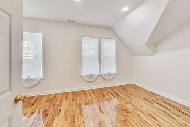 8251 S E End Ave, Chicago, IL 60617 - bonus room with vaulted ceiling, wood finished floors, and recessed lighting