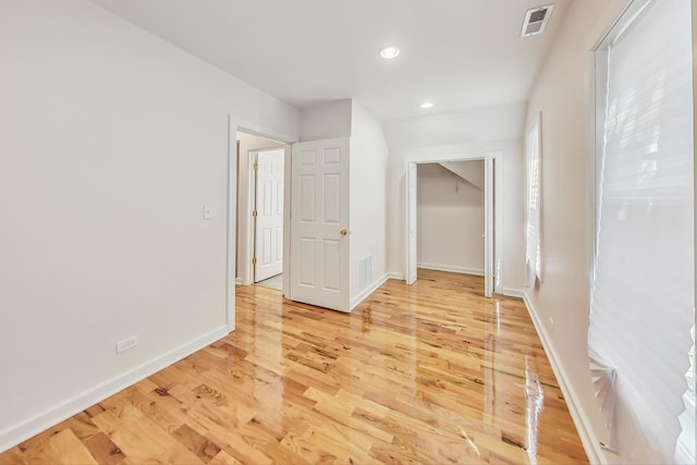 8251 S E End Ave, Chicago, IL 60617 - unfurnished bedroom with light wood-style flooring and recessed lighting