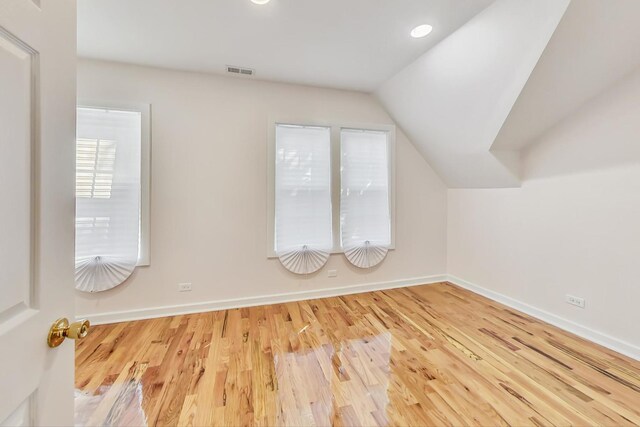 8251 S E End Ave, Chicago, IL 60617 - bonus room with lofted ceiling, wood finished floors, and recessed lighting