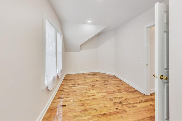 8251 S E End Ave, Chicago, IL 60617 - additional living space with light wood-style floors, lofted ceiling, and recessed lighting