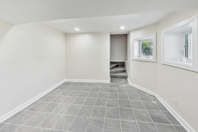 8251 S E End Ave, Chicago, IL 60617 - basement with recessed lighting, stairs, and tile patterned flooring
