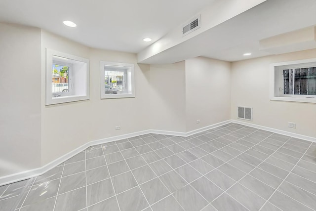 8251 S E End Ave, Chicago, IL 60617 - basement featuring tile patterned flooring and recessed lighting