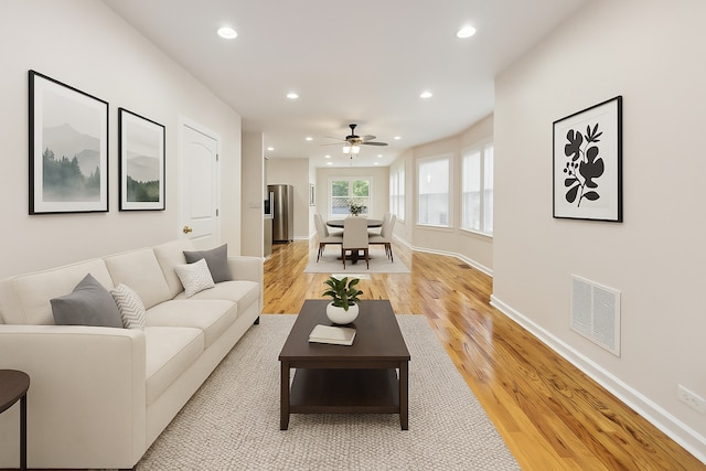 8251 S E End Ave, Chicago, IL 60617 - living room with recessed lighting, light wood-style flooring, and a ceiling fan