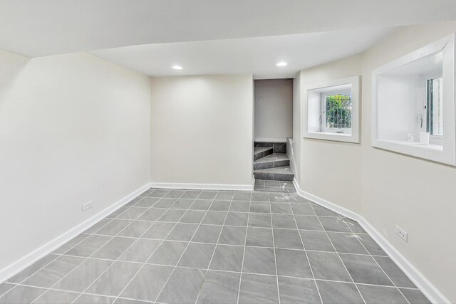 8251 S E End Ave, Chicago, IL 60617 - finished basement featuring stairway, recessed lighting, and tile patterned flooring