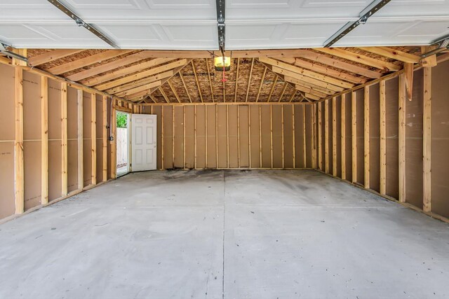 8251 S E End Ave, Chicago, IL 60617 - garage featuring a garage door opener