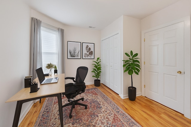 8251 S E End Ave, Chicago, IL 60617 - home office with light wood-type flooring and baseboards