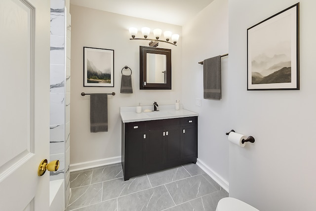 8251 S E End Ave, Chicago, IL 60617 - bathroom with vanity, marble look tiles, and a shower