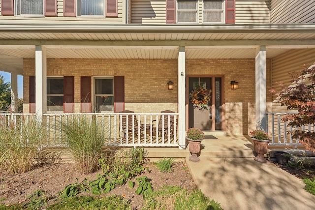 entrance to property with covered porch