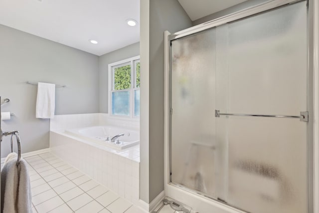 bathroom featuring tile patterned floors and plus walk in shower