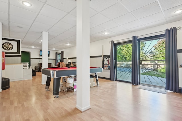 rec room with wood-type flooring, billiards, and a drop ceiling