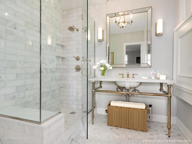 bathroom featuring vanity and a shower with shower door