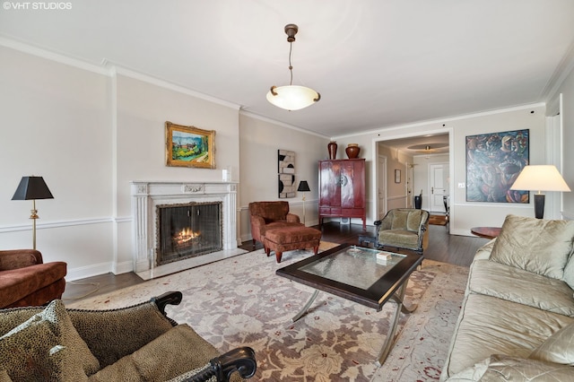 living room with hardwood / wood-style flooring and ornamental molding