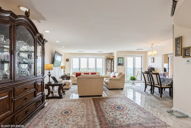 living room featuring an inviting chandelier