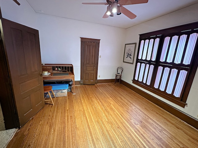 interior space featuring ceiling fan and light wood-type flooring