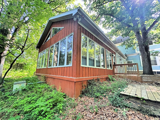 view of property exterior featuring a deck