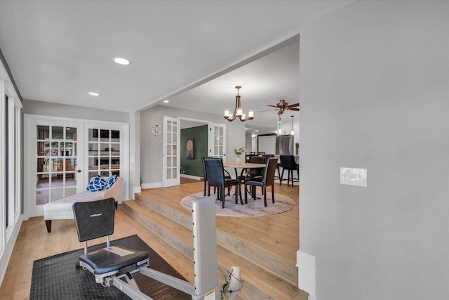 interior space with light hardwood / wood-style flooring and a chandelier