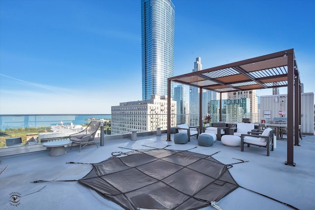 view of patio / terrace with a pergola and a water view