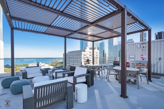 view of patio / terrace featuring an outdoor living space, a pergola, and a water view