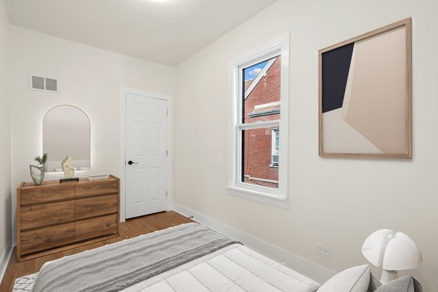 bedroom featuring light hardwood / wood-style flooring