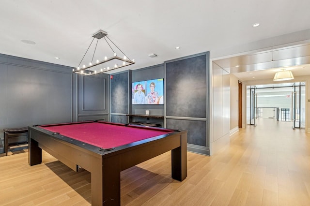 recreation room with pool table and light wood-type flooring