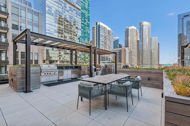 view of patio / terrace featuring a grill, a pergola, and area for grilling