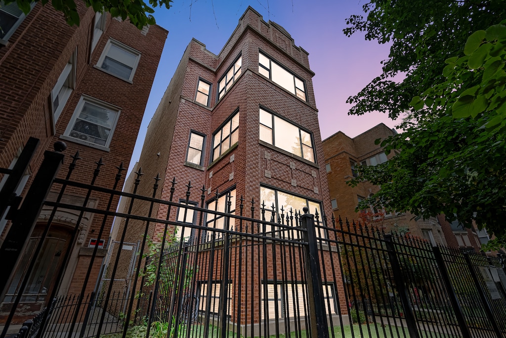 view of property exterior at dusk