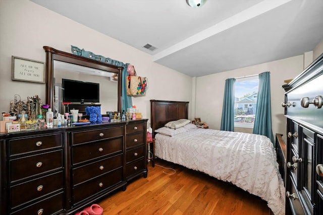 bedroom featuring hardwood / wood-style floors