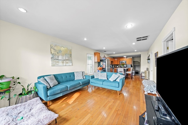 living room featuring light wood-type flooring