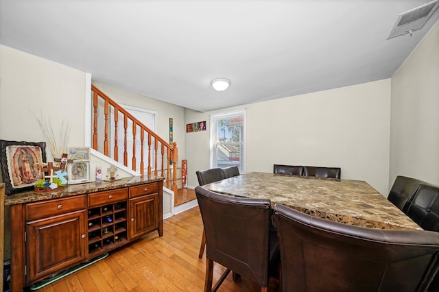 dining room featuring light hardwood / wood-style floors