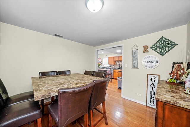 dining area featuring light hardwood / wood-style floors