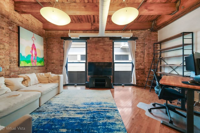 office space featuring wooden ceiling, wood-type flooring, brick wall, and beam ceiling