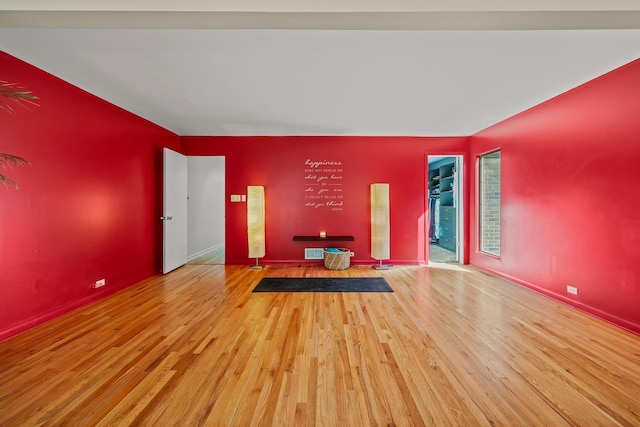 unfurnished living room featuring light hardwood / wood-style floors