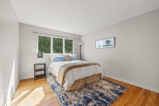 bedroom featuring light wood-type flooring