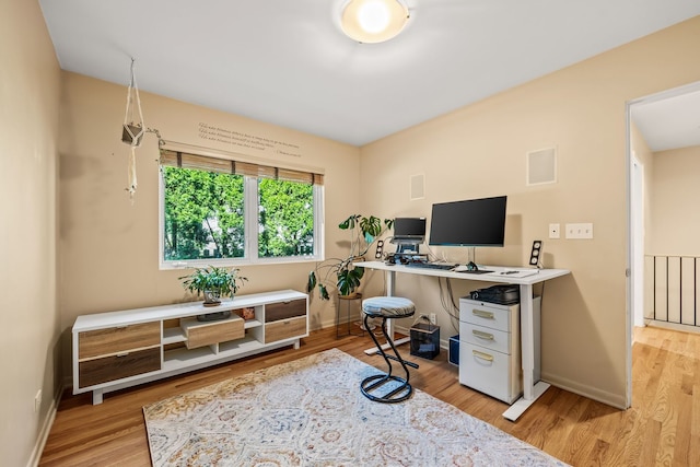 office space featuring light hardwood / wood-style flooring