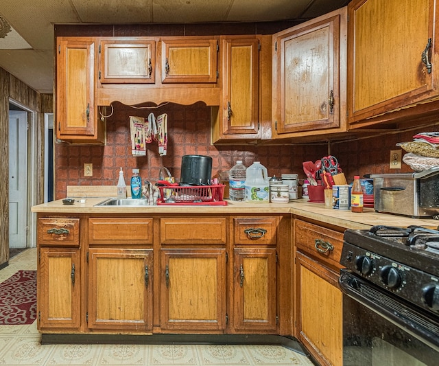 kitchen featuring black gas range oven