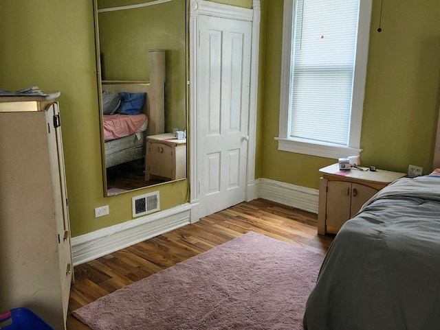 bedroom featuring light hardwood / wood-style floors