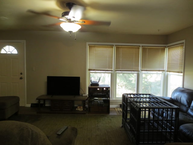 living room with ceiling fan