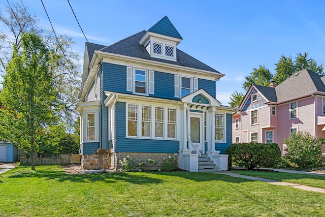 view of front facade with a front yard