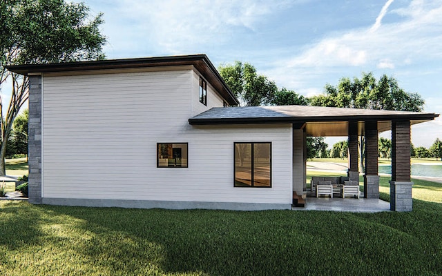 exterior space featuring a patio area and a yard