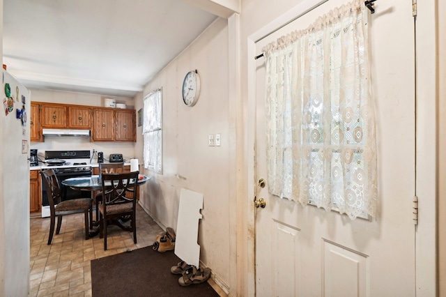 kitchen with white gas stove