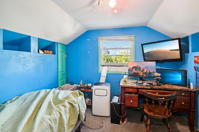 carpeted bedroom with vaulted ceiling